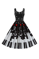 Schwarzes ärmelloses bedrucktes Kleid aus den 1950er Jahren